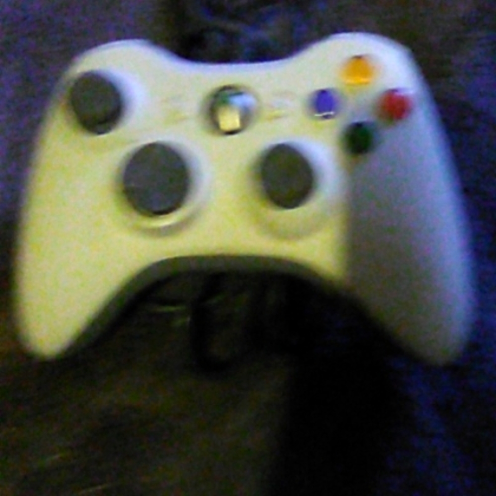 Exbox 360 used joystick with extended cord.